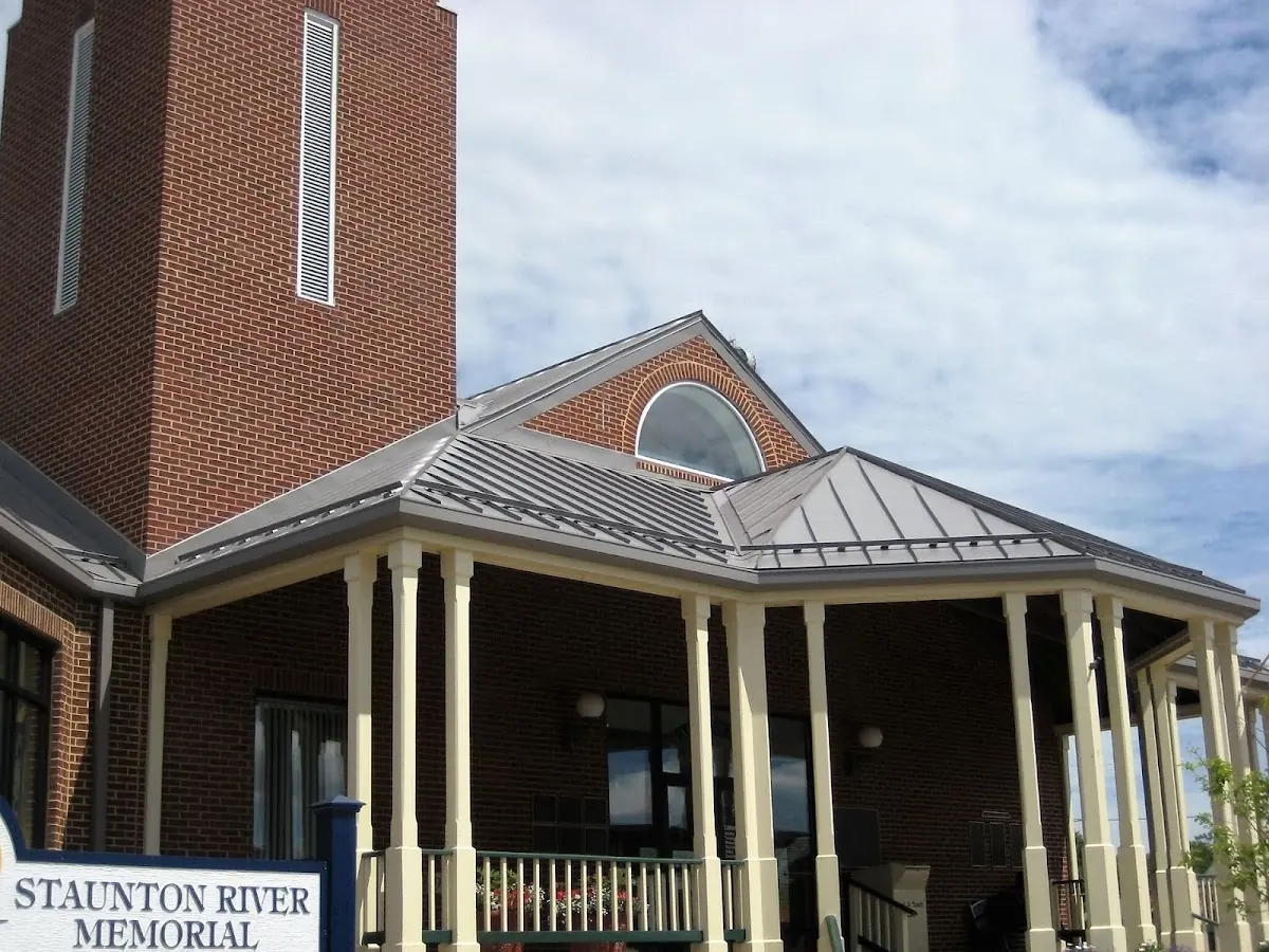 Skilled roofing craftsmen working on a residential roof in North Forestville